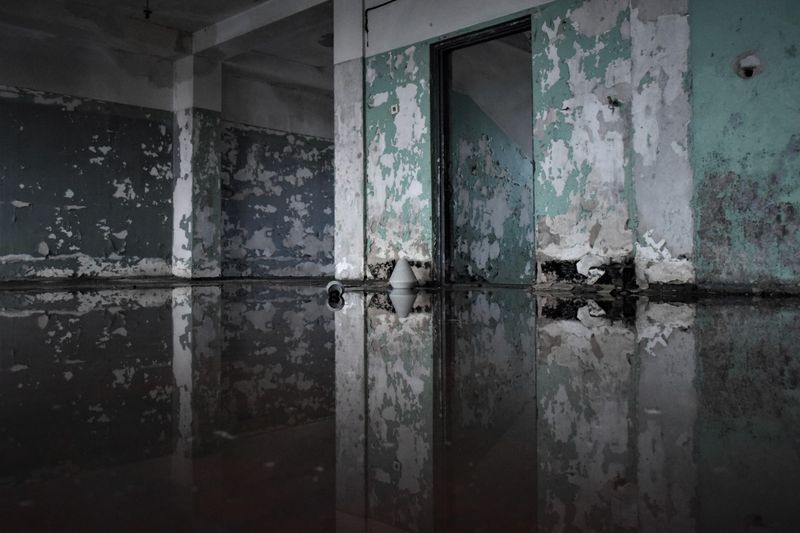 Flooded room being dried out during water damage restoration
